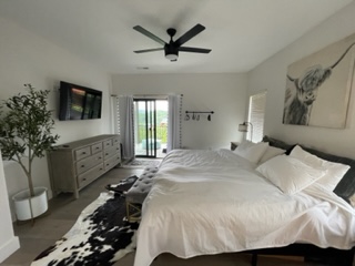 Bedroom 1: King Bed (Ensuite with soaking tub + dual shower)