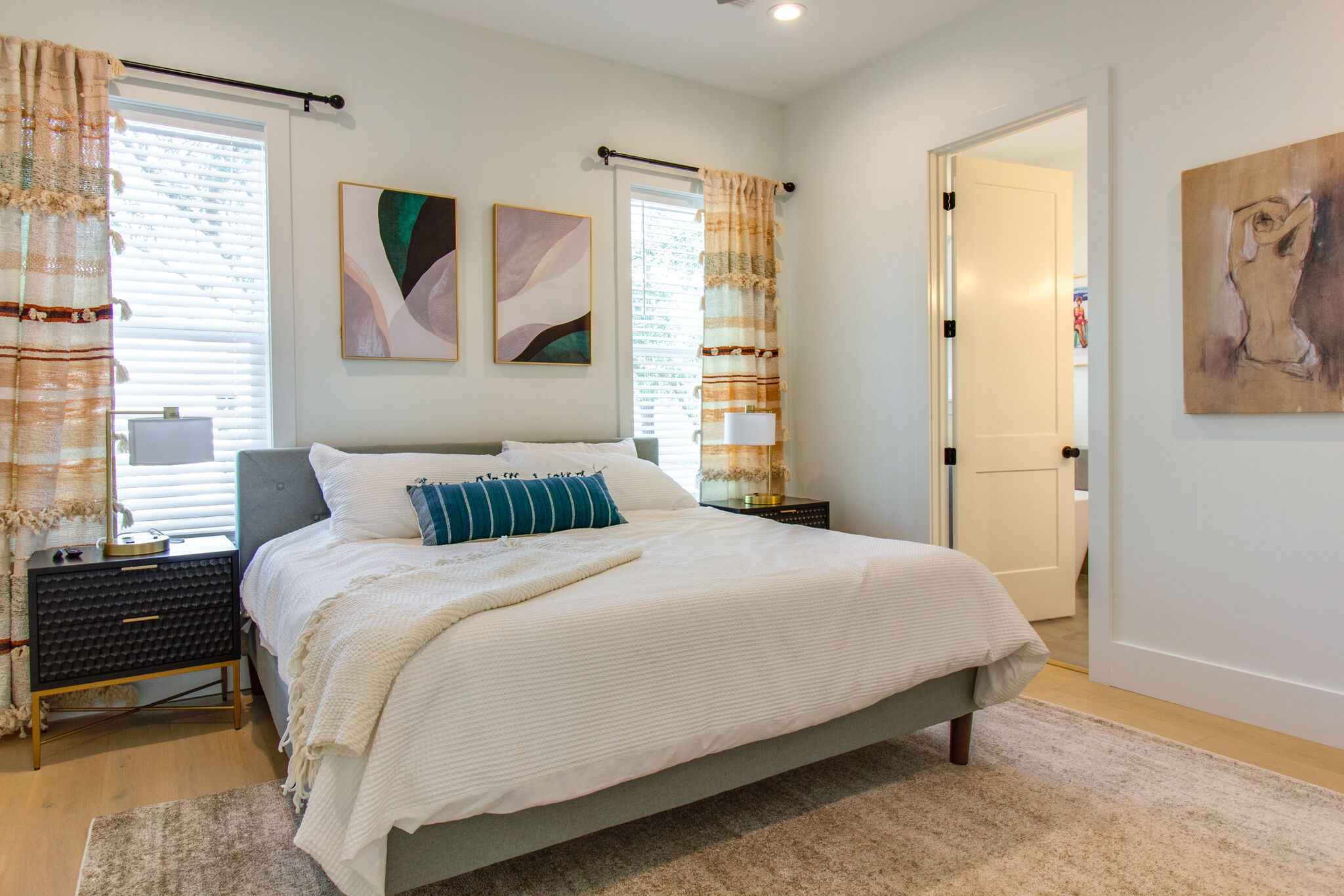 Bedroom 1 (Primary) : King Bed with ensuite (soaking tub + rainfall shower)